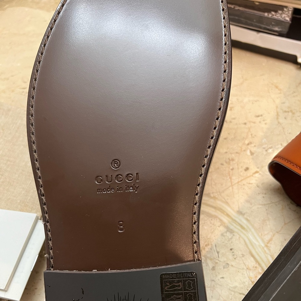 Brown Gucci sandals